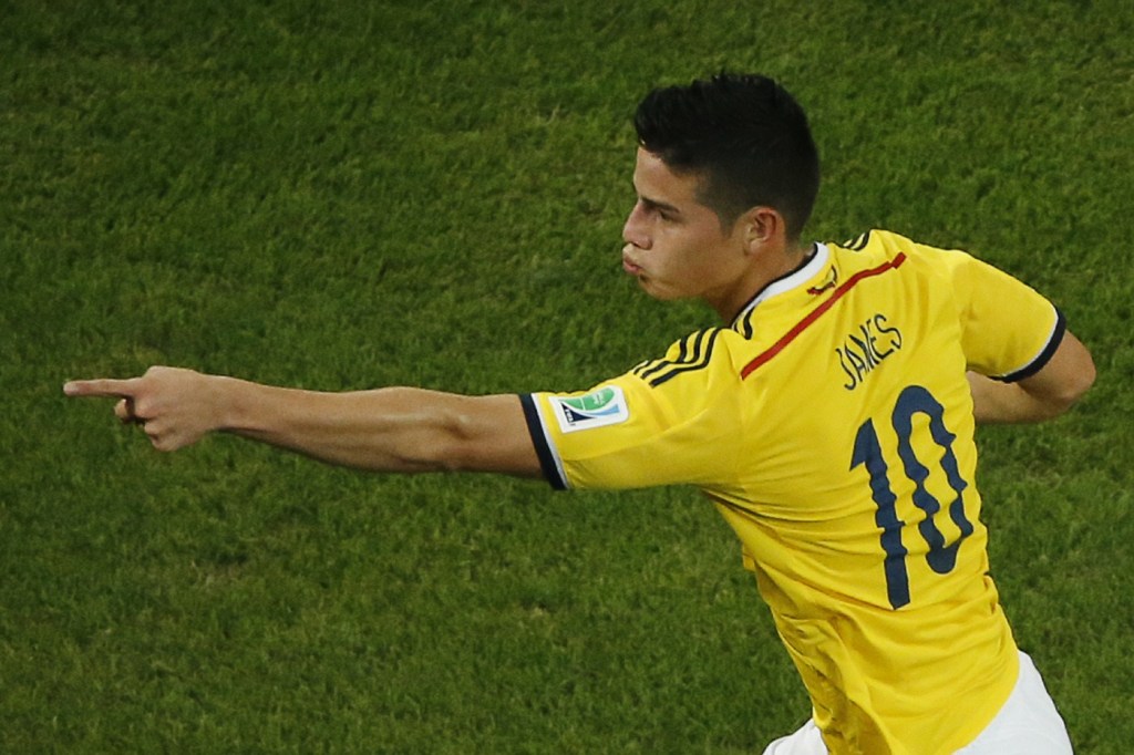 Colombia's midfielder James Rodriguez runs as he celebrates his second goal during the Round of 16 football match between Colombia and Uruguay at The Maracana Stadium in Rio de Janeiro on June 28, 2014, during the 2014 FIFA World Cup. AFP PHOTO / FABRIZIO BENSCH/POOL (Photo credit should read FABRIZIO BENSCH/AFP/Getty Images)