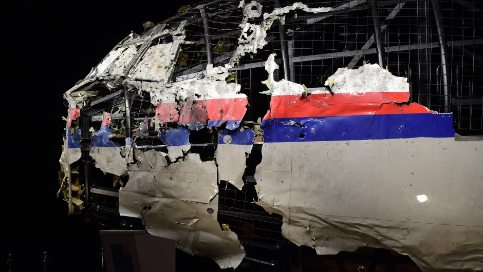 The wrecked cockipt of the Malaysia Airlines flight MH17 is exhibited during a presentation of the final report on the cause of the its crash at the Gilze Rijen airbase October 13, 2015. Air crash investigators have concluded that Malaysia Airlines flight MH17 was shot down by a missile fired from rebel-held eastern Ukraine, sources close to the inquiry said today, triggering a swift Russian denial. The findings are likely to exacerbate the tensions between Russia and the West, as ties have strained over the Ukraine conflict and Moscow's entry into the Syrian war. AFP PHOTO / EMMANUEL DUNAND (Photo credit should read EMMANUEL DUNAND/AFP/Getty Images)