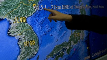 Kuo Kai-wen, director of Taiwan's Seismology Center, points at the locations from a monitor showing North Korea's first hydrogen bomb test site, in Taipei on January 6, 2016. North Korea said it had carried out a 'successful' miniaturised hydrogen bomb test -- a shock announcement that, if confirmed, would massively raise the stakes in the hermit states bid to strengthen its nuclear arsenal. AFP PHOTO / Sam Yeh / AFP / SAM YEH (Photo credit should read SAM YEH/AFP/Getty Images)