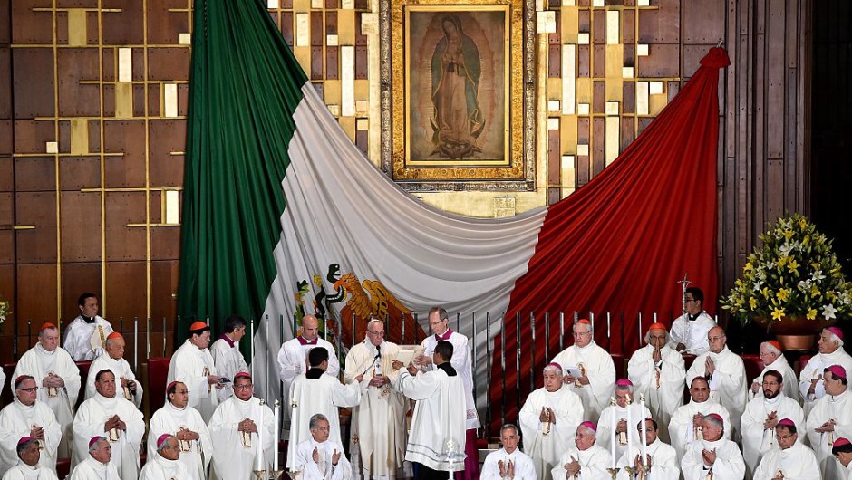 Pope Francis (C) officiates a Holy Mass in the Basilica of Our Lady of Guadalupe in Mexico on February 13, 2016. Pope Francis is in Mexico for a trip encompassing two of the defining themes of his papacy: bridge-building diplomacy and his concern for migrants seeking a better life. AFP PHOTO / GABRIEL BOUYS / AFP / GABRIEL BOUYS (Photo credit should read GABRIEL BOUYS/AFP/Getty Images)