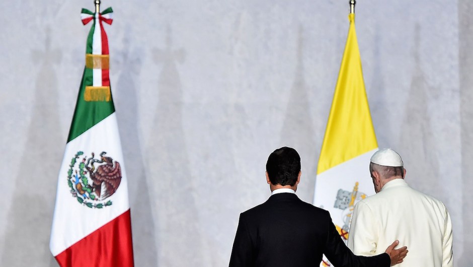 Pope Francis is welcomed by Mexican President Enrique Pena Nieto (L) at the National Palace in Mexico on February 13, 2016. Pope Francis called on Mexico's leaders Saturday to provide "true justice" and security to citizens hit by drug violence as he addressed politicians at the National Palace. AFP PHOTO / GABRIEL BOUYS / AFP / GABRIEL BOUYS (Photo credit should read GABRIEL BOUYS/AFP/Getty Images)
