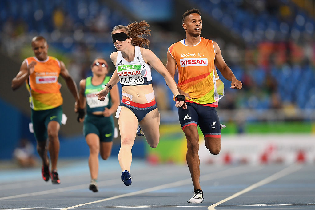 RIO DE JANEIRO, BRAZIL - SEPTEMBER 12: Libby Clegg of Great Britain competes in the Women's 200m - T11 semi final on day 5 of the Rio 2016 Paralympic Games at the Olympic Stadium on September 12, 2016 in Rio de Janeiro, Brazil. (Photo by Atsushi Tomura/Getty Images for Tokyo 2020)