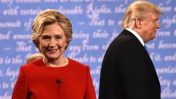 TOPSHOT - Democratic nominee Hillary Clinton (L) and Republican nominee Donald Trump leave the stage after the first presidential debate at Hofstra University in Hempstead, New York on September 26, 2016. / AFP / Timothy A. CLARY (Photo credit should read TIMOTHY A. CLARY/AFP/Getty Images)