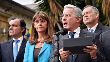 Colombian former president (2002-2010) and current Senator Alvaro Uribe (2-R) gestures after a meeting with Colombian President Juan Manuel Santos, next to Colombian former presidential candidates Oscar Ivan Zuluaga (L) and Marta Lucia Ramirez (2-L), and Inspector General Of Colombia Alejandro Ordonez (R) at Narino presidential palace in Bogota on October 5, 2016. Colombian President Juan Manuel Santos was meeting top opponents of his failed peace deal with the FARC rebels Wednesday after setting an end-of-the-month deadline to salvage the peace process or return to war. Voters on Sunday rejected the peace deal with the leftist guerrillas. / AFP / GUILLERMO LEGARIA (Photo credit should read GUILLERMO LEGARIA/AFP/Getty Images)