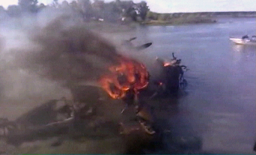 TV grab from Russian NTV channel showing burning remains of a plane at a crash site outside Yaroslavl airport on September 7, 2011 some 300 kilometres (185 miles) northeast of Moscow . At least 44 people were killed September 7, 2011 when a Russian jet carrying hockey players of Lokomotiv Yaroslavl to their first match of the KHL (Kontinental Hockey League) season crashed on takeoff in the latest blow to the country's tainted air safety record. AFP PHOTO/ NTV (Photo credit should read ALEXANDER NEMENOV/AFP/Getty Images)