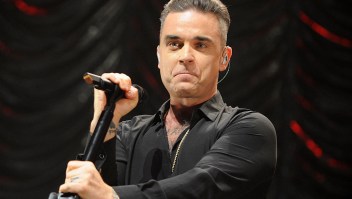 MANCHESTER, ENGLAND - DECEMBER 09: Robbie Williams performs on stage at Key 103 Christmas Live at Manchester Arena on December 9, 2016 in Manchester, England. (Photo by Shirlaine Forrest/Getty Images)