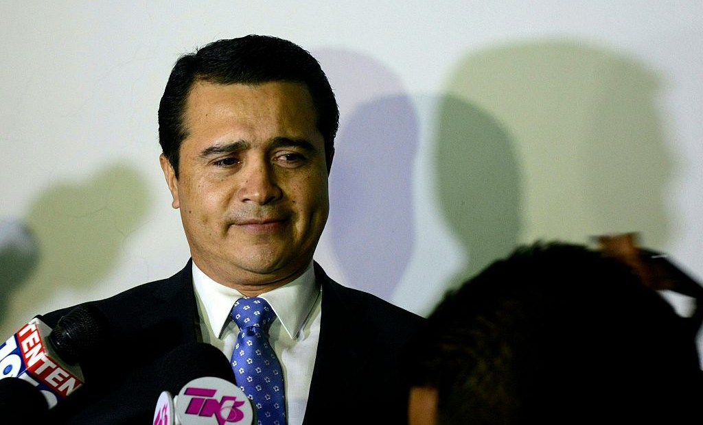 The brother of Honduran President Juan Orlando Hernandez and deputy for the ruling Partido Nacional de Honduras, Juan Antonio Hernandez prepares to speak with the press upon arrival at the Toncontin international airport from the United States, on October 25, 2016 in Tegucigalpa. Earlier this month, Honduran army captain Santos Rodriguez Orellana accused the US Drug Enforcement Administration (DEA) of pressuring him to implicate Hernandez of involvement in a plan to kill the US ambassador, whilst the US is investigating Orellana for alleged corruption and ties to drugs gangs. President Hernandez pledged not to support his brother if it turns out the army captain is involved in drug-related crime as alleged. / AFP / ORLANDO SIERRA (Photo credit should read ORLANDO SIERRA/AFP/Getty Images)