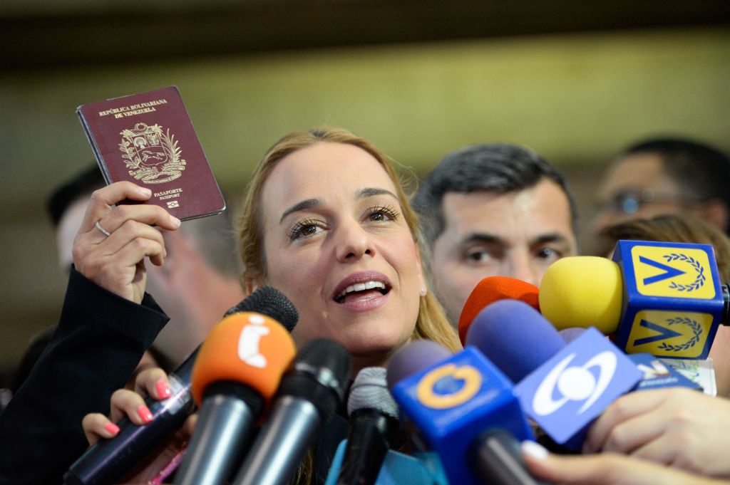 The wife of jailed Venezuelan opposition leader Leopoldo Lopez, Lilian Tintori talks to the media upon her arrival at the Simon Bolivar International Airport from the United States, in Maiquetia, Venezuela on February 16, 2017. Venezuela's Supreme Court on Thursday upheld opposition leader Leopoldo Lopez's nearly 14-year prison sentence, a day after US President Donald Trump called for his release. / AFP / FEDERICO PARRA (Photo credit should read FEDERICO PARRA/AFP/Getty Images)