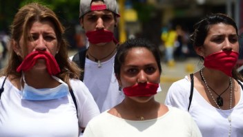enezuelans gathered Saturday for "silent marches" against President Nicolas Maduro, a test of his government's tolerance for peaceful protests after three weeks of violent unrest that has left 20 people dead. / AFP PHOTO / RONALDO SCHEMIDT (Photo credit should read RONALDO SCHEMIDT/AFP/Getty Images)