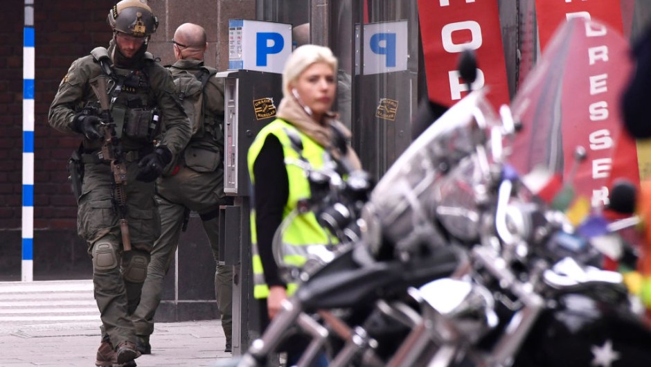 Armed police forces work at the scene where a truck crashed into the Ahlens department store at Drottninggatan in central Stockholm, April 7, 2017. / AFP PHOTO / Jonathan NACKSTRAND / ALTERNATIVE CROP (Photo credit should read JONATHAN NACKSTRAND/AFP/Getty Images)