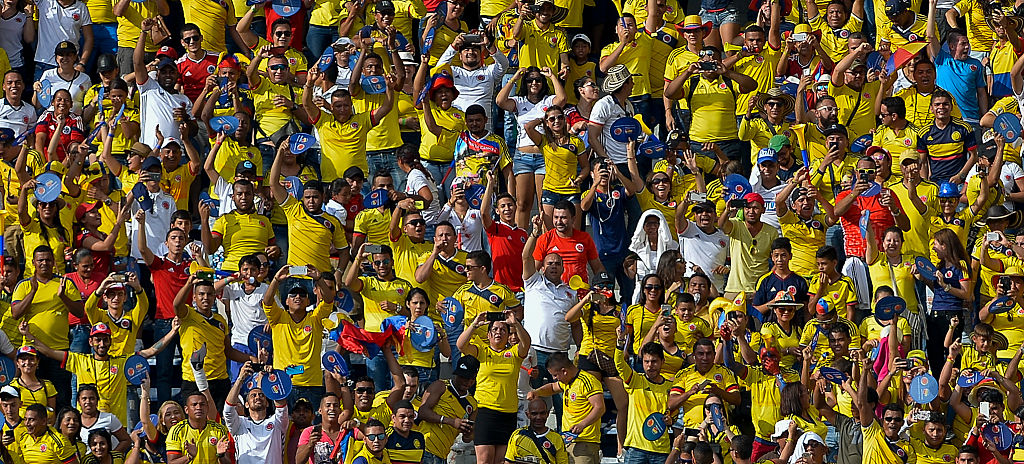 Colombia's fans celebrate James Rodriguez goal against Venezuela during their WC 2018 football qualification match in Barranquilla, Colombia on September 1, 2016. / AFP / LUIS ROBAYO (Photo credit should read LUIS ROBAYO/AFP/Getty Images)