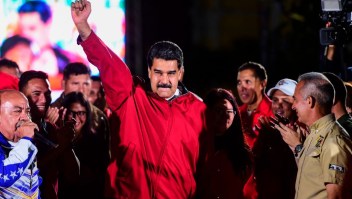 TOPSHOT - Venezuelan president Nicolas Maduro celebrates the results of "Constituent Assembly", in Caracas, on July 31, 2017. Deadly violence erupted around the controversial vote, with a candidate to the all-powerful body being elected shot dead and troops firing weapons to clear protesters in Caracas and elsewhere. / AFP PHOTO / RONALDO SCHEMIDT (Photo credit should read RONALDO SCHEMIDT/AFP/Getty Images)