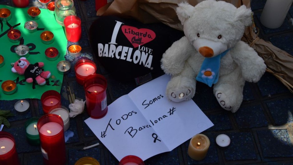 Stuffed toys, candles, messages, flowers and other objects are displayed for the victims of the Barcelona attack on the Rambla boulevard on August 18, 2017, a day after a van ploughed into the crowd, killing 13 persons and injuring over 100 on the Rambla in Barcelona. Drivers have ploughed on August 17, 2017 into pedestrians in two quick-succession, separate attacks in Barcelona and another popular Spanish seaside city, leaving 13 people dead and injuring more than 100 others. In the first incident, which was claimed by the Islamic State group, a white van sped into a street packed full of tourists in central Barcelona on Thursday afternoon, knocking people out of the way and killing 13 in a scene of chaos and horror. Some eight hours later in Cambrils, a city 120 kilometres south of Barcelona, an Audi A3 car rammed into pedestrians, injuring six civilians -- one of them critical -- and a police officer, authorities said. / AFP PHOTO / Pascal GUYOT (Photo credit should read PASCAL GUYOT/AFP/Getty Images)