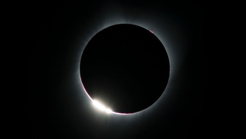 TOPSHOT - The "diamond ring effect" is seen during a total solar eclipse as seen from the Lowell Observatory Solar Eclipse Experience on August 21, 2017 in Madras, Oregon. Millions will be able to witness the total eclipse that will touch land in Oregon on the west coast and continue through South Carolina on the east coast. / AFP PHOTO / STAN HONDA (Photo credit should read STAN HONDA/AFP/Getty Images)