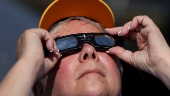 CASPER, WY - AUGUST 21: A visitor looks at the solar eclipse at South Mike Sedar Park on August 21, 2017 in Casper, Wyoming. Millions of people have flocked to areas of the U.S. that are in the "path of totality" in order to experience a total solar eclipse. During the event, the moon will pass in between the sun and the Earth, appearing to block the sun. (Photo by Justin Sullivan/Getty Images)