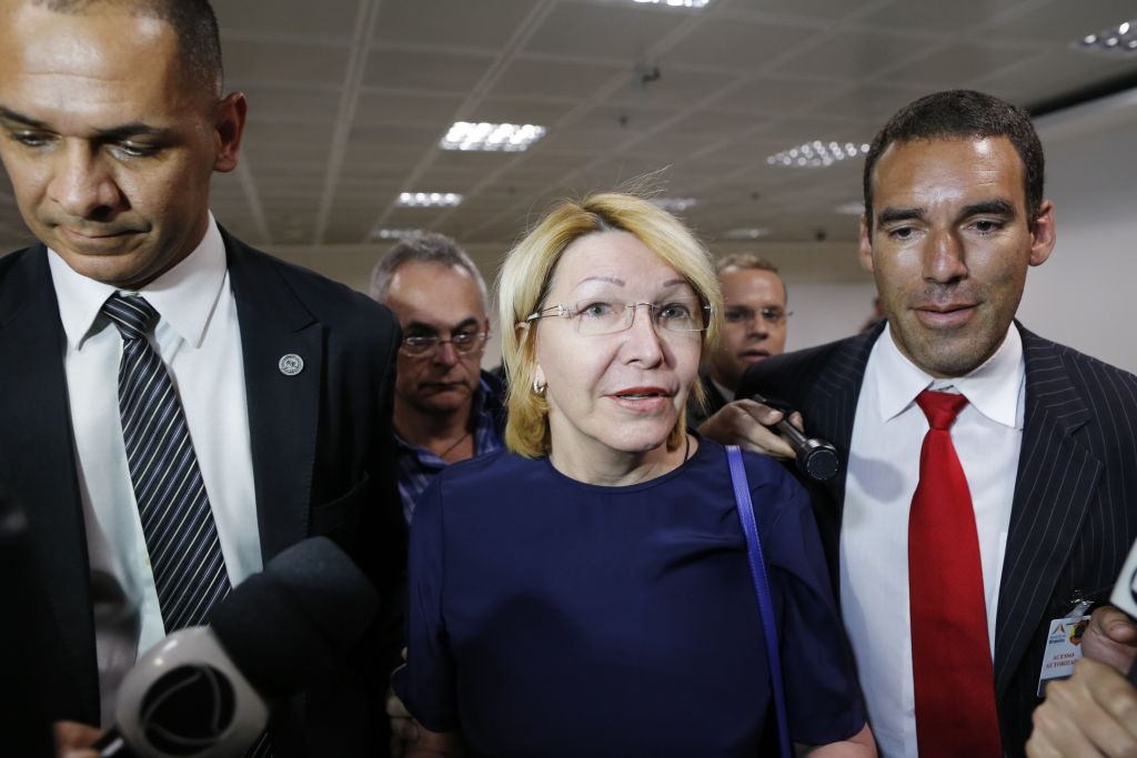 Venezuela's fugitive ex-chief prosecutor, Luisa Ortega, arrives at Brasilia's International Airport on August 23, 2017. Ortega is expected to attend a meeting of Latin America's Mercosur group of countries in the Brazilian capital. She fled Venezuela last week after becoming strongman President Nicolas Maduro's highest ranking domestic critic. / AFP PHOTO / Sergio Lima (Photo credit should read SERGIO LIMA/AFP/Getty Images)