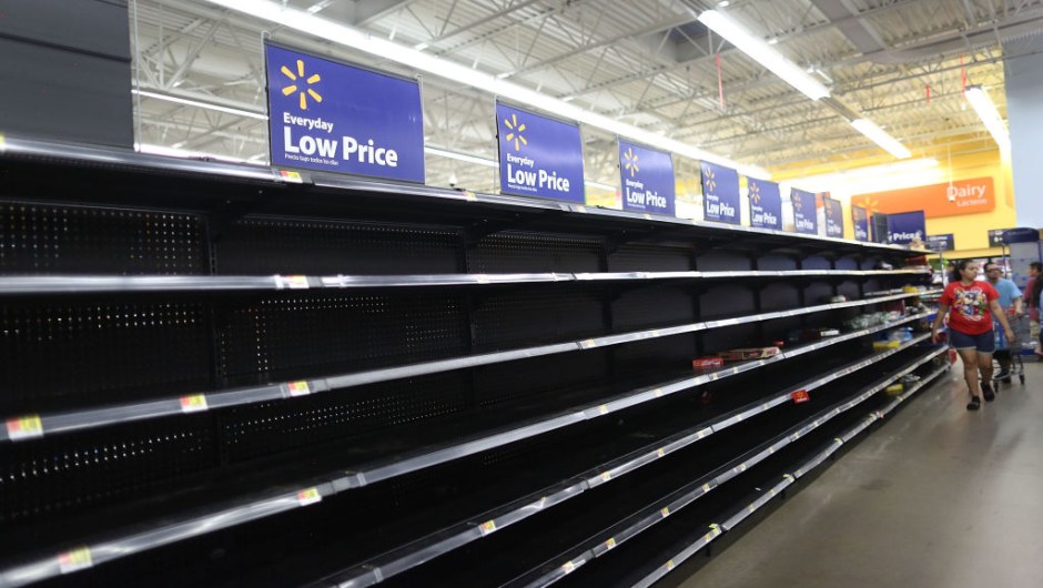 HOUSTON, TX - AUGUST 24: The bread section of a Walmart store is empty as people prepare for the possible arrival of Hurricane Harvey on August 24, 2017 in Houston, Texas. Hurricane Harvey has intensified into a hurricane and is aiming for the Texas coast with the potential for up to 3 feet of rain and 125 mph winds.(Photo by Joe Raedle/Getty Images)