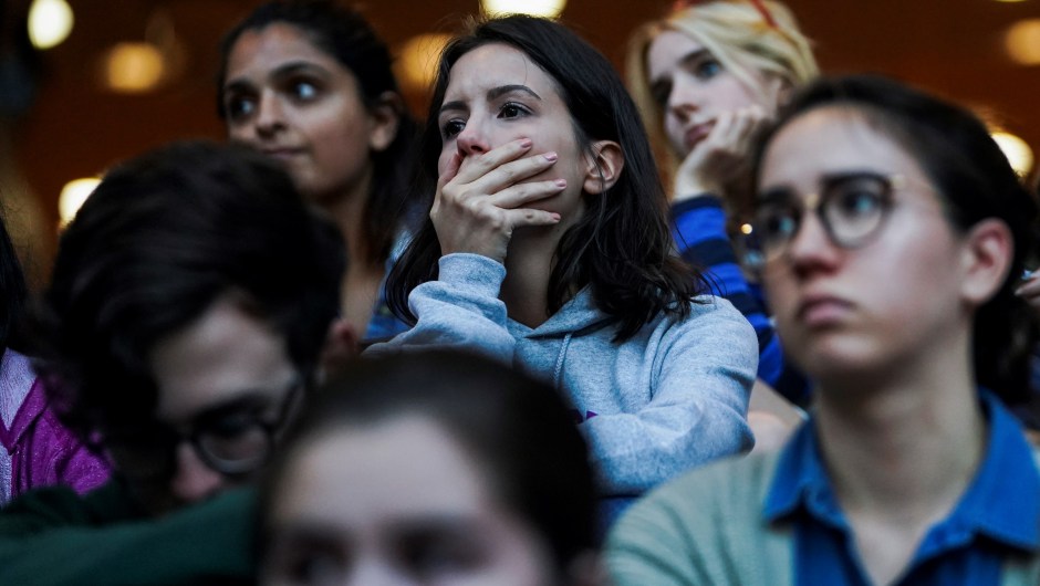 New York University (NYU) students attend a vigil for the victims of the mass shooting in Las Vegas, on October 2, 2017 in New York. The death toll from the deadliest mass shooting in US history rose to 58 on Monday as officials reacted cautiously to an Islamic State claim of responsibility for the massacre at a concert on the Las Vegas Strip. Police said Stephen Craig Paddock, 64, a wealthy former accountant, smashed windows in his 32nd floor hotel room Sunday night and trained bursts of automatic weapons fire on concert-goers below. / AFP PHOTO / Jewel SAMAD (Photo credit should read JEWEL SAMAD/AFP/Getty Images)