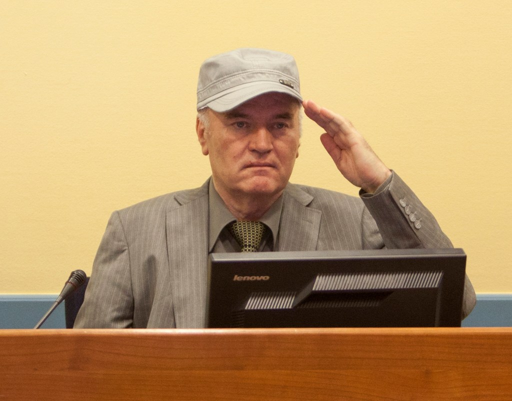 THE HAGUE, NETHERLANDS - JUNE 3: (NETHERLANDS OUT) (EDITORS NOTE: ALTERNATE CROP) Ratko Mladic makes his first appearance at the International Criminal Tribunal on June 3, 2011 in The Hague, Netherlands. Ex-Bosnian Serb army leader Ratko Mladic will make his first appearance at The Hague war crimes tribunal after being declared fit to stand trial. Mladic was arrested a week ago after going into hiding for the past 16 years and is charged with atrocities committed during the Bosnian war. (Photo Serge Ligtenberg/Getty Images )