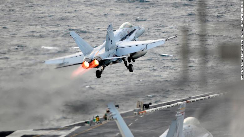 71111-N-KB563-1237 WESTERN PACIFIC (Nov. 11, 2017) An F/A-18E Super Hornet, assigned to the Stingers of Strike Fighter Attack Squadron (VFA) 113, launches from the flight deck of the aircraft carrier USS Theodore Roosevelt (CVN 71) in the western Pacific Ocean. Aircraft carriers, Theodore Roosevelt, Ronald Reagan, and Nimitz strike groups are underway conducting flight operations in international waters as part of a three-carrier strike force exercise. The U.S. Pacific Fleet has patrolled the Indo-Pacific region routinely for more than 70 years promoting regional security, stability and prosperity. (U.S. Navy photo by Mass Communication Specialist 1st Class Michael Russell/Released)