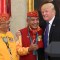 President Donald Trump, right, meets with Navajo Code Talkers Peter MacDonald, center, and Thomas Begay, left, in the Oval Office of the White House in Washington, Monday, Nov. 27, 2017. (AP Photo/Susan Walsh