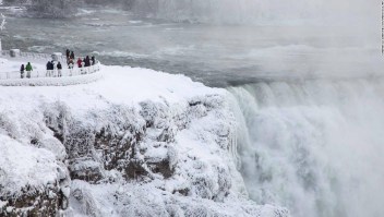 People visit the Niagara Falls during extreme cold weather as sub-zero temperatures are expected across Canada and the United States on New Year's Eve and New Year's day. Seasonal weather, New York, USA - 31 Dec 2017 (Rex Features via AP Images)