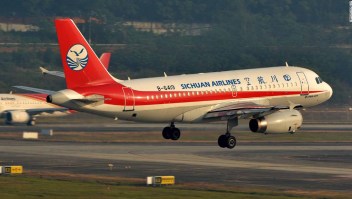 (180514) -- CHENGDU, May 14, 2018 (Xinhua) -- Flight 3U8633, operated by Sichuan Airlines, prepares to conduct emergency landing after a mechanical failure in Chengdu Shuangliu International Airport in Chengdu, capital of southwest China's Sichuan Province, May 14, 2018. Part of the cockpit window broke as the Airbus A319 flew over Chengdu. The plane was en route from southwest China's Chongqing Municipality to Lhasa, capital of Tibet Autonomous Region. It was forced to divert to an alternate airport in Chengdu. All passengers are safe, although the co-pilot sustained injuries to the face and waist, and another crew member was slightly hurt during the emergency landing. After the landing on Monday morning, the airline has arranged another flight to take the passengers to Lhasa. (Xinhua/Wan Bi) (ry) (Photo by Xinhua/Sipa USA)