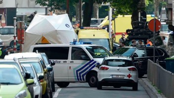 Police and ambulance are seen at the site where a gunman shot dead three people, two of them policemen, before being killed by elite officers, in the eastern Belgian city of Liege on May 29, 2018. - The shooting occurred around 10:30am (0830 GMT) on a major artery in the city close to a high school. "We don't know anything yet," the spokeswoman for the Liege prosecutors office, told AFP when asked about the shooter's motives. (Photo by JOHN THYS / AFP) (Photo credit should read JOHN THYS/AFP/Getty Images)