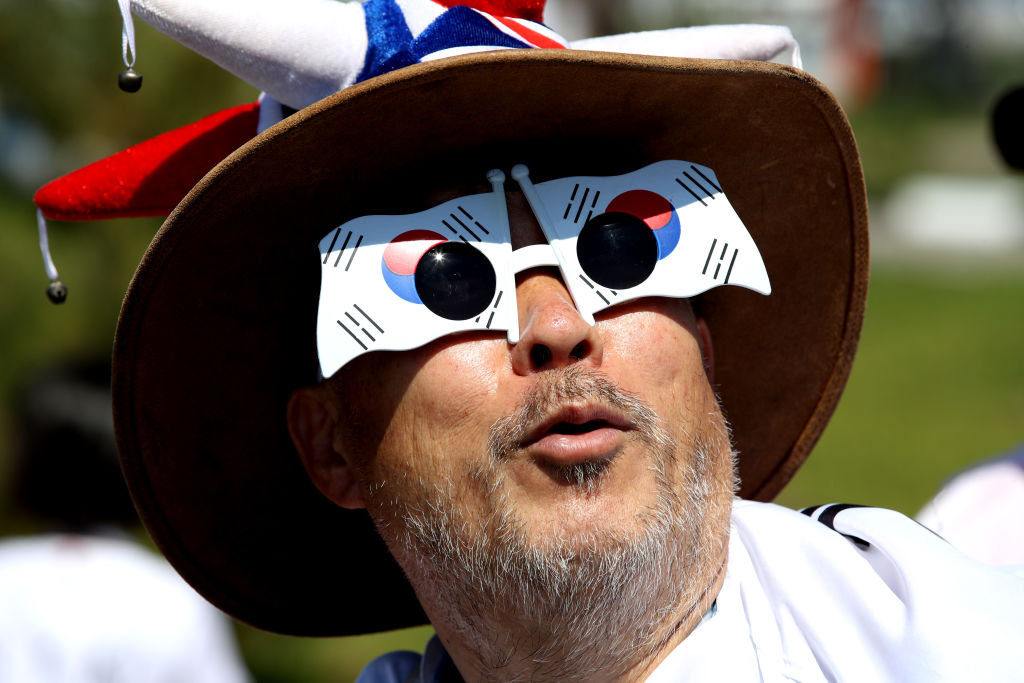 NIZHNIY NOVGOROD, RUSSIA - JUNE 18: A Korea Republic fan enjoys the pre match atmosphere during the 2018 FIFA World Cup Russia group F match between Sweden and Korea Republic at Nizhniy Novgorod Stadium on June 18, 2018 in Nizhniy Novgorod, Russia. (Photo by Clive Brunskill/Getty Images)