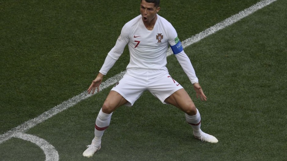 Portugal's forward Cristiano Ronaldo celebrates his opening goal for Portugal during the Russia 2018 World Cup Group B football match between Portugal and Morocco at the Luzhniki Stadium in Moscow on June 20, 2018. (Photo by Juan Mabromata / AFP) / RESTRICTED TO EDITORIAL USE - NO MOBILE PUSH ALERTS/DOWNLOADS (Photo credit should read JUAN MABROMATA/AFP/Getty Images)