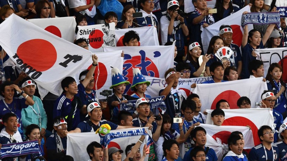 Japan fans cheer before the Russia 2018 World Cup Group H football match between Japan and Senegal at the Ekaterinburg Arena in Ekaterinburg on June 24, 2018. (Photo by Anne-Christine POUJOULAT / AFP) / RESTRICTED TO EDITORIAL USE - NO MOBILE PUSH ALERTS/DOWNLOADS (Photo credit should read ANNE-CHRISTINE POUJOULAT/AFP/Getty Images)