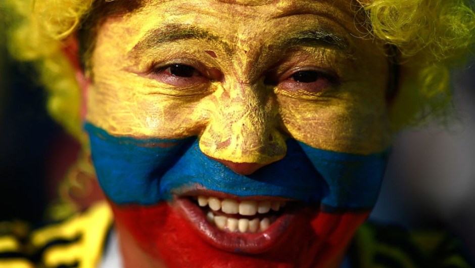 TOPSHOT - A Colombia's football fan poses before the Russia 2018 World Cup Group H football match between Poland and Colombia at the Kazan Arena in Kazan on June 24, 2018. (Photo by Benjamin CREMEL / AFP) / RESTRICTED TO EDITORIAL USE - NO MOBILE PUSH ALERTS/DOWNLOADS (Photo credit should read BENJAMIN CREMEL/AFP/Getty Images)