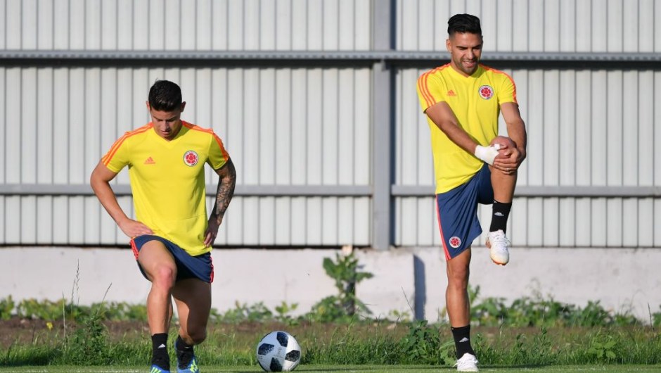 Colombia's forward James Rodriguez (L) and teammate forward Falcao attend a training session on the eve of the Russia 2018 World Cup Group H football match between Colombia and Senegal, on June 27, 2018 in Samara. (Photo by Emmanuel DUNAND / AFP) (Photo credit should read EMMANUEL DUNAND/AFP/Getty Images)