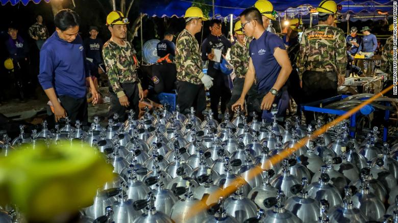 CHIANG RAI, THAILAND - JULY 01: Scuba tanks are delivered to the site for Thai navy & SEAL on July 01, 2018 in Chiang Rai, Thailand. Rescuers in northern Thailand looked for alternative ways into a flooded cave as they continued the search for 12 boys and their soccer coach who have been missing in Tham Luang Nang Non cave since Saturday night after monsoon rains blocked the main entrance. U.S. Forces and British divers joined the search as they worked their way through submerged passageways in the sprawling underground caverns as the search intensifies for the young soccer team, aged between 11 to 16, and their their 25-year-old coach. (Photo by Linh Pham/Getty Images)