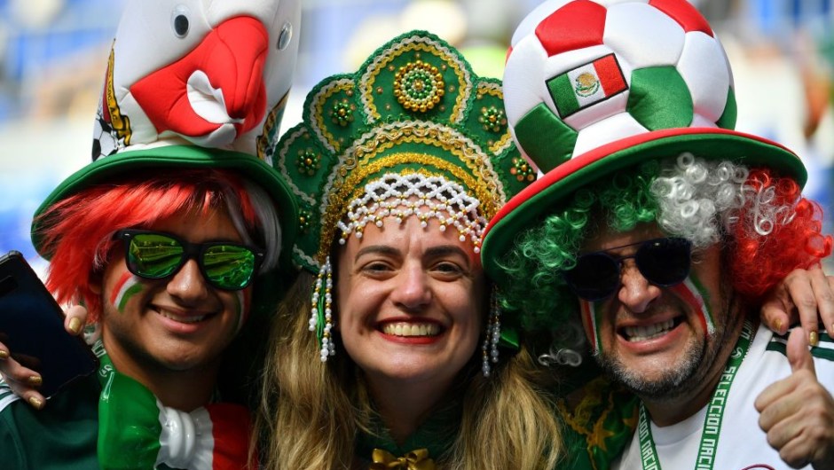 Mexico fans pose before the Russia 2018 World Cup round of 16 football match between Brazil and Mexico at the Samara Arena in Samara on July 2, 2018. (Photo by EMMANUEL DUNAND / AFP) / RESTRICTED TO EDITORIAL USE - NO MOBILE PUSH ALERTS/DOWNLOADS (Photo credit should read EMMANUEL DUNAND/AFP/Getty Images)