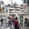 Trabajadores buscan sobrevivientes tras colapso de edificios por el terremoto en Ciudad de México en 2017. (Crédito: YURI CORTEZ/AFP/Getty Images)