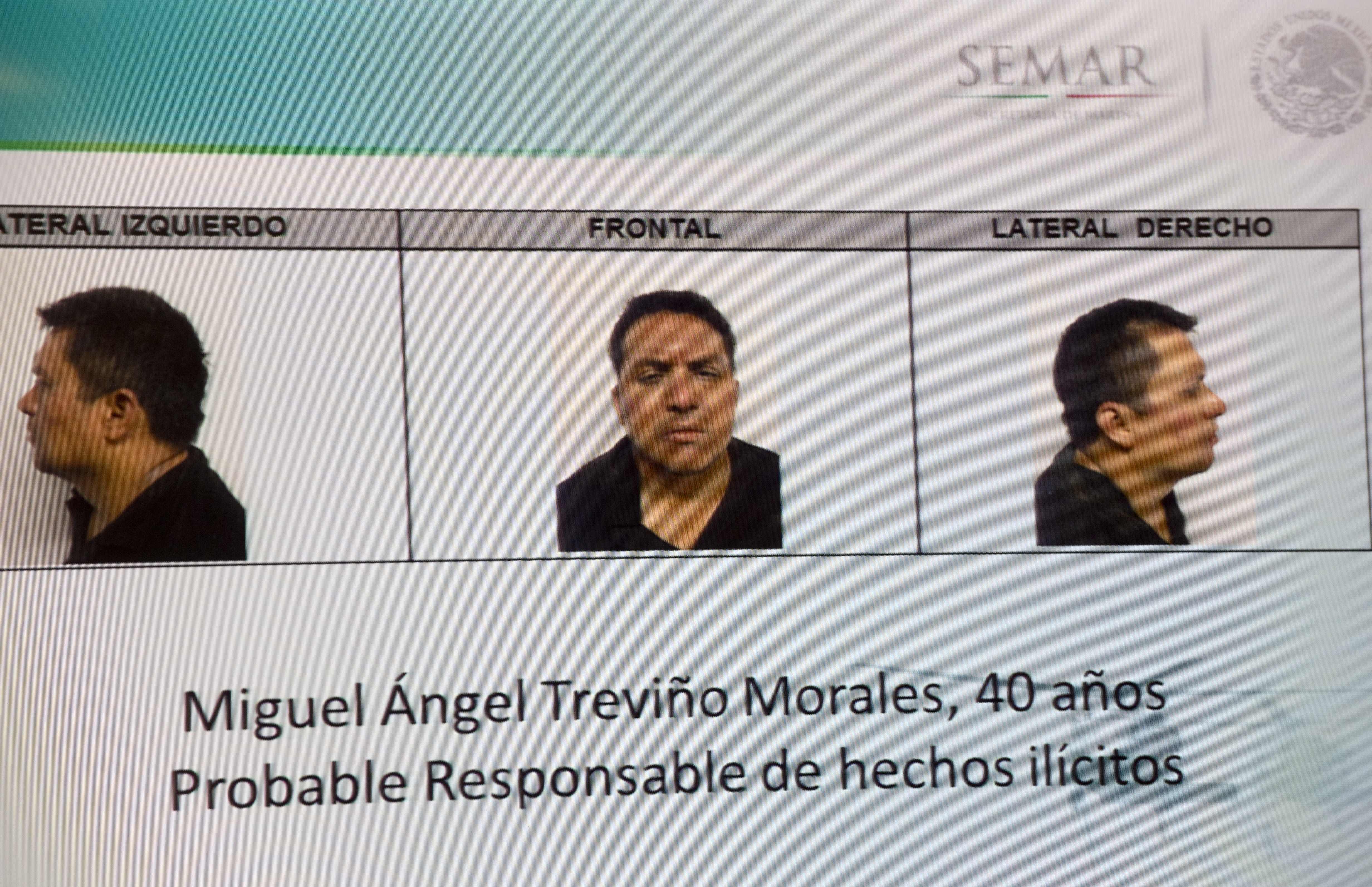 Picture taken from a sreen of the alleged maximun leader of drugs Mexican cartel "Los Zetas", Miguel Angel Trevino Morales, presented in combo pictures during a press conference at the head quarter of Interior Ministry on July 15, 2013 in Mexico City. According to a spokesman Trevino was arrested early morning during a military operation en Nuevo Laredo. AFP PHOTO/ Yuri CORTEZ (Photo credit should read YURI CORTEZ/AFP/Getty Images)