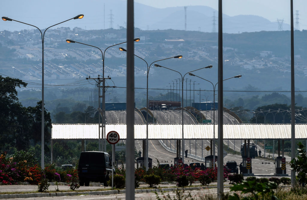 General view of Tienditas international bridge in Urena, Tachira state, Venezuela, in the border with Colombia, blocked by containers placed by Venezuelan military forces, on February 11, 2019. - Venezuela's opposition announced Monday a new collection center for desperately-needed supplies as it prepares to "send a message" to the military that's blocking humanitarian aid from entering the crisis-wracked country with a mass street protest. (Photo by Juan BARRETO / AFP) (Photo credit should read JUAN BARRETO/AFP/Getty Images)