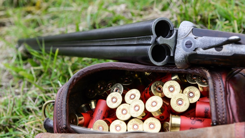 OXFORDSHIRE, ENGLAND - OCTOBER 23: A gun and cartridges at a pheasant and partridge shoot on October 23, 2015 in Oxfordshire, England. The UK pheasant shooting season begins on October 1st, 2015 and ends on February 1st, 2016.  During the season around 50 million game birds are released for shooting, the sport shooting industry is worth an estimated £1.6 billion to the British economy. The most common type of game bird shoot is "driven shooting" where beaters drive the birds towards a line of stationary guns. (Photo by Chris Ratcliffe/Getty Images)