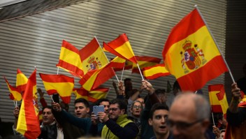 Far-right party Vox supporters wave Spanish flags during campaign rally in Seville on April 24, 2019 ahead of the April 28 general election. (Photo by CRISTINA QUICLER / AFP) (Photo credit should read CRISTINA QUICLER/AFP/Getty Images)