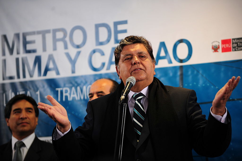Peruvian President Alan Garcia speaks to the media during the inauguration of the first section for the electric train in Lima on July 11, 2011. AFP PHOTO/ERNESTO BENAVIDES (Photo credit should read ERNESTO BENAVIDES/AFP/Getty Images)