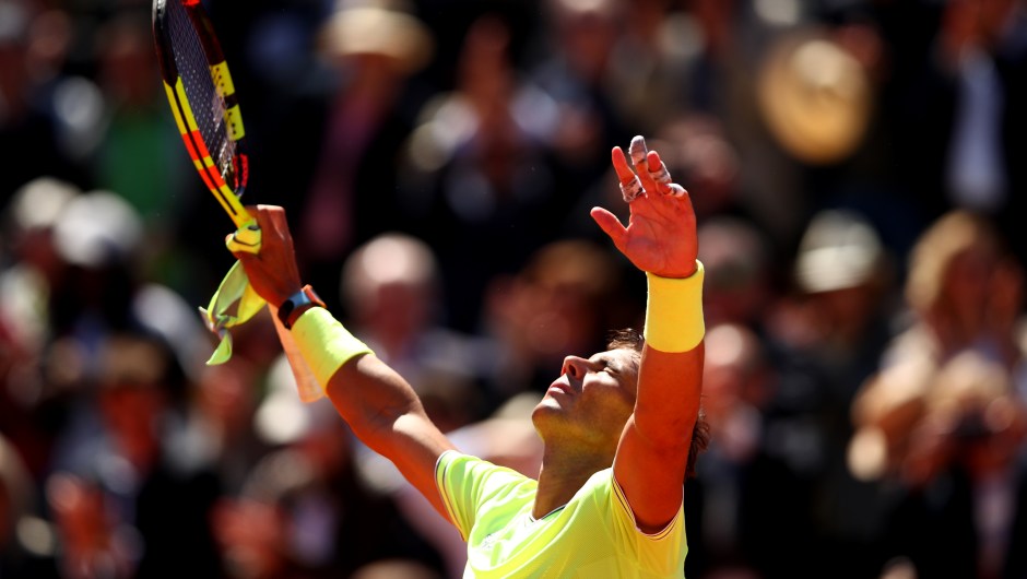 PARIS, FRANCE - JUNE 07: Rafael Nadal of Spain celebrates victory during his mens singles semi-final match against Roger Federer of Switzerland during Day thirteen of the 2019 French Open at Roland Garros on June 07, 2019 in Paris, France. (Photo by Clive Brunskill/Getty Images)