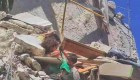 niña colgando siria bombardeos