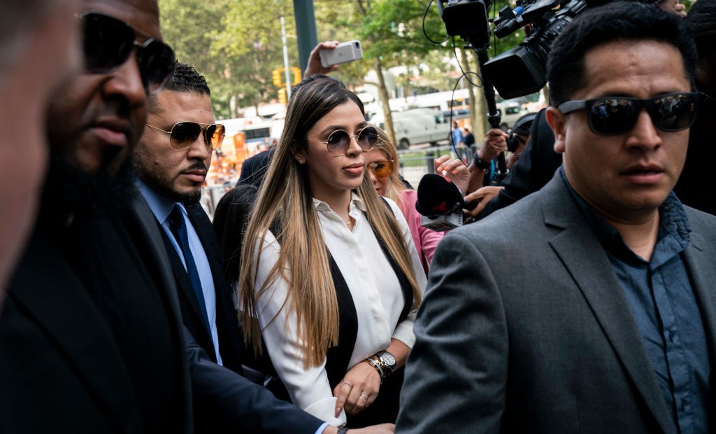 NEW YORK, NY - JULY 17: Emma Coronel Aispuro, wife of Joaquin "El Chapo" Guzman, is surrounded by security as she arrives at federal court on July 17, 2019 in New York City. El Chapo was found guilty on all charges in a drug conspiracy trial and will be sentenced this morning. (Photo by Drew Angerer/Getty Images)