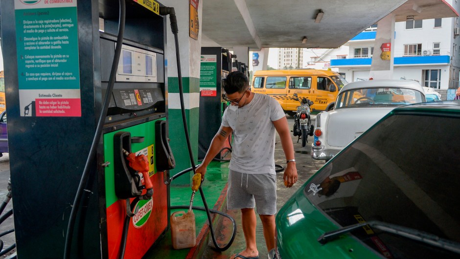 A man fills a can with fuel at a gas station of Havana, on September 12, 2019. - President Miguel Diaz Canel blamed the United States on Wednesday for Cuba's fuel shortage. In his address, he said the "low availability of diesel" will affect transport, merchandise distribution and electricity generation. The US Treasury Department has imposed sanctions on various companies for transporting Venezuelan petroleum to Cuba. (Photo by YAMIL LAGE / AFP) (Photo credit should read YAMIL LAGE/AFP/Getty Images)