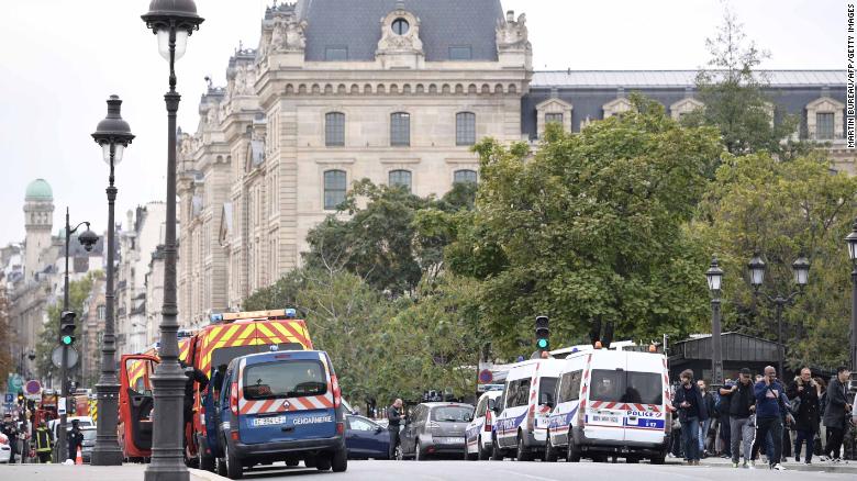 Police vehicles are parked near Paris prefecture de police (police headquarters) after three persons have been hurt in a knife attack on October 3, 2019. (Photo by Martin BUREAU / AFP) (Photo by MARTIN BUREAU/AFP via Getty Images)