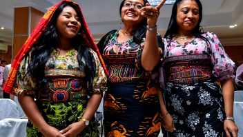 Panama's Guna Yala indigenous women wearing Molas (Guna's hand made textile) attend a press conference in Panama City, on May 21, 2019. - Representatives of natives Guna requested the manufacturer of sportswear and footwear Nike to suspend the launch of a new shoe with a Panamanian Kuna mola print (a hand-made textile) on it, scheduled for next June 6 in Puerto Rico. (Photo by Luis ACOSTA / AFP) (Photo credit should read LUIS ACOSTA/AFP/Getty Images)