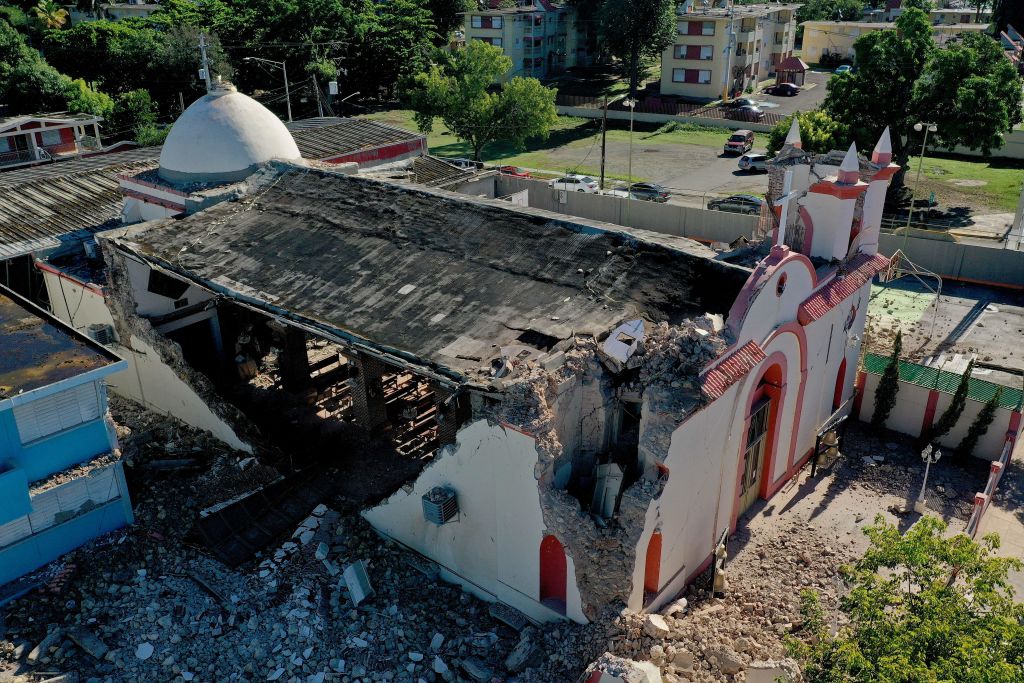 The Inmaculada Concepcion church, built in 1841, is seen partially collapsed after an  earthquake hit the island in Guayanilla, Puerto Rico on January 7, 2020. - A strong earthquake struck south of Puerto Rico early January 7, 2020 followed by major aftershocks, the US Geological Survey said, the latest in a series of tremors that have shaken the island since December 28. The shallow 6.4 magnitude quake struck five miles (eight kilometers) south of the community of Indios, the USGS said, revising down its initial reading of 6.6. (Photo by Ricardo ARDUENGO / AFP) (Photo by RICARDO ARDUENGO/AFP via Getty Images)