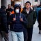 A pedestrian is seen wearing a surgical face mask on Regents Street in central London on February 27, 2020. - European and US stock markets slumped heavily again Thursday as new coronavirus infections spread outside China. Around 2,800 people have died in China and more than 80,000 have been infected. There have been more than 50 deaths and 3,600 cases in dozens of other countries, raising fears of a pandemic. (Photo by Niklas HALLE'N / AFP) (Photo by NIKLAS HALLE'N/AFP via Getty Images)