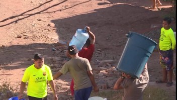 Hondureños enfrentan covid-19 en medio de crisis de agua